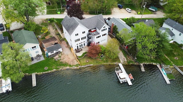 drone / aerial view with a water view