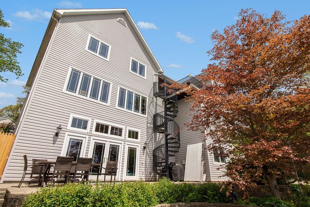 rear view of house with a patio