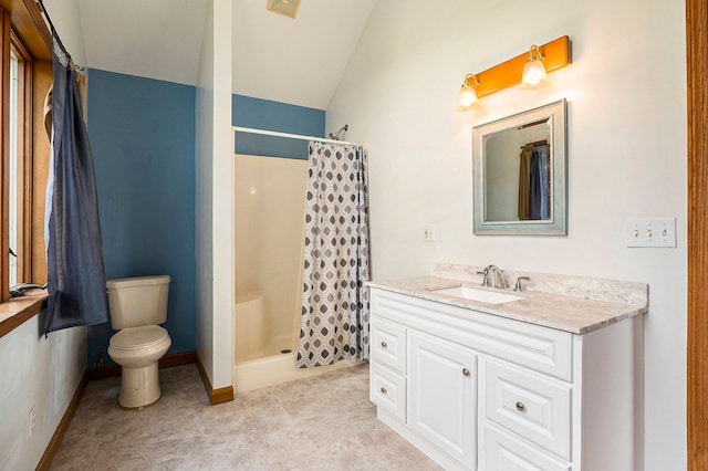 bathroom with a shower with curtain, vanity, lofted ceiling, and toilet