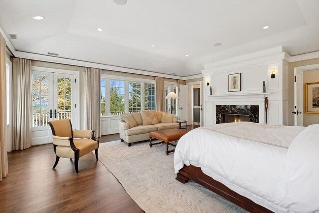 49106 Sun Valley Falls Blvd, New Buffalo, MI 49117 - bedroom featuring access to outside, wood finished floors, french doors, a raised ceiling, and recessed lighting