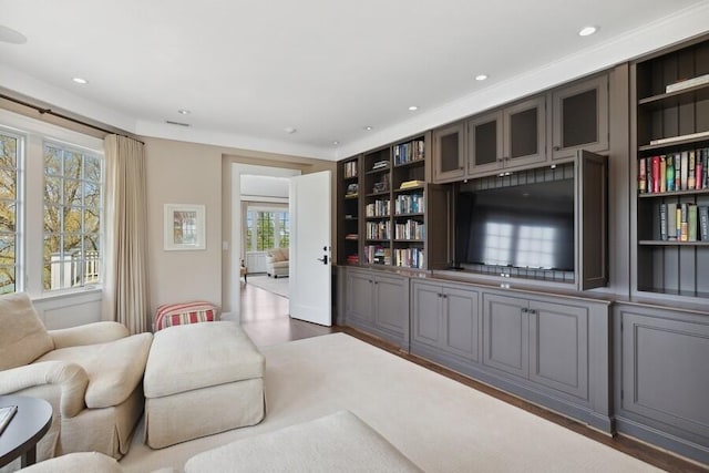 49106 Sun Valley Falls Blvd, New Buffalo, MI 49117 - living room with built in shelves, recessed lighting, and wood finished floors