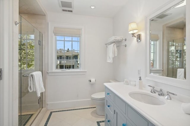 49106 Sun Valley Falls Blvd, New Buffalo, MI 49117 - full bathroom with vanity, baseboards, a shower stall, inlaid floor details, and toilet
