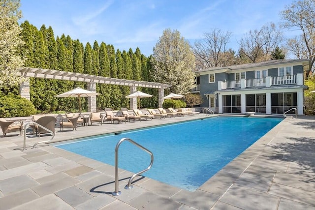 49106 Sun Valley Falls Blvd, New Buffalo, MI 49117 - community pool with a patio and a pergola