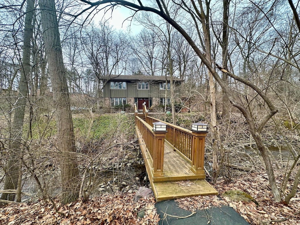 28405 Danvers, Farmington Hills, MI 48334 - back of house with a wooden deck