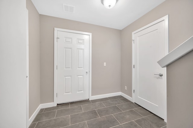 view of tiled foyer entrance