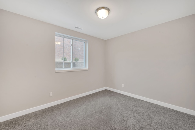 view of carpeted spare room