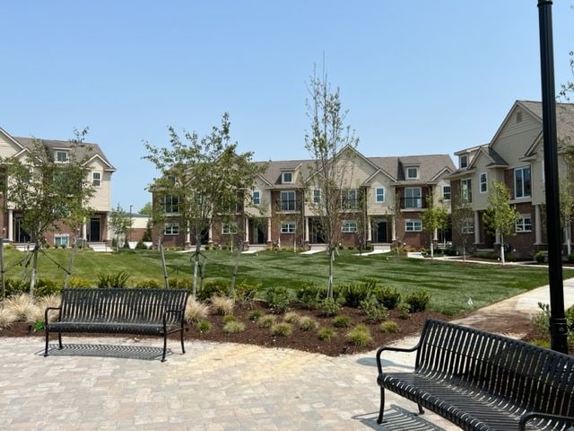 surrounding community featuring a lawn