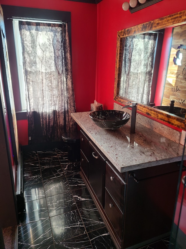 bathroom with vanity and toilet