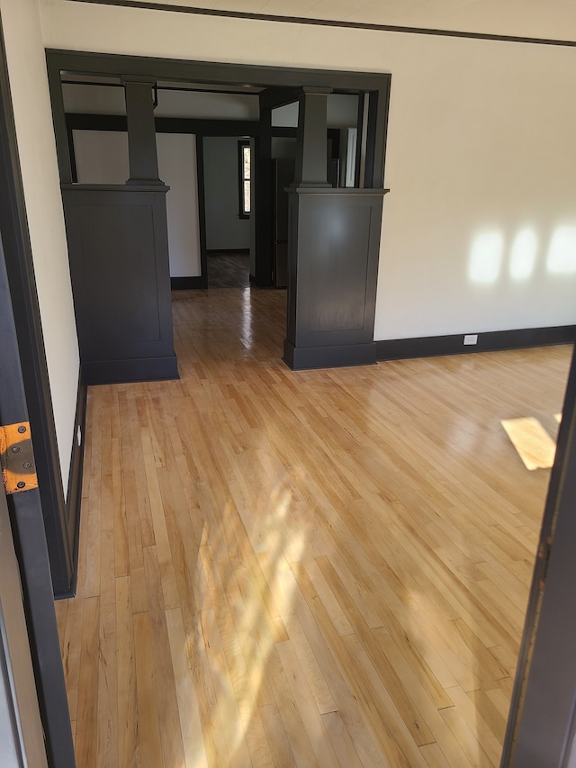 unfurnished room featuring wood-type flooring