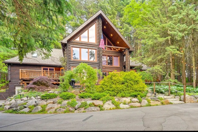 view of log cabin