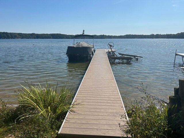 view of dock with a water view