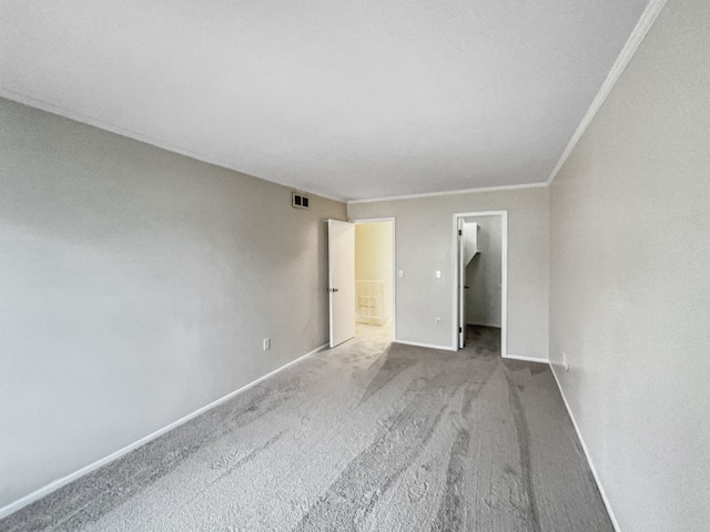 22037 Shore Pointe Ln # 64, Saint Clair Shores, MI 48080 - unfurnished bedroom with baseboards, ornamental molding, carpet flooring, and a spacious closet