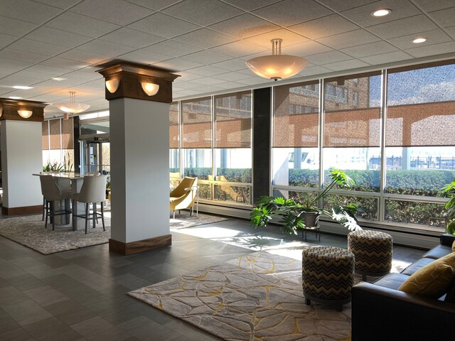 8900 E Jefferson Ave Unit 1431, Detroit, MI 48214 - community lobby with expansive windows and recessed lighting