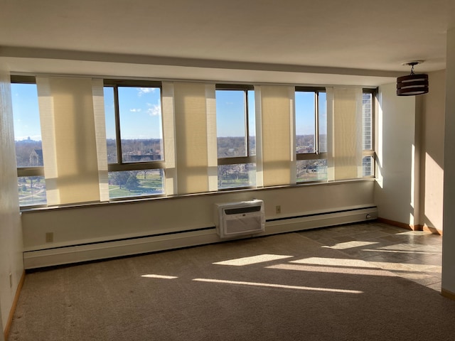 carpeted empty room featuring a baseboard radiator