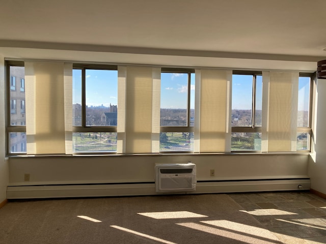 8900 E Jefferson Ave Unit 1431, Detroit, MI 48214 - empty room with healthy amount of natural light and baseboards