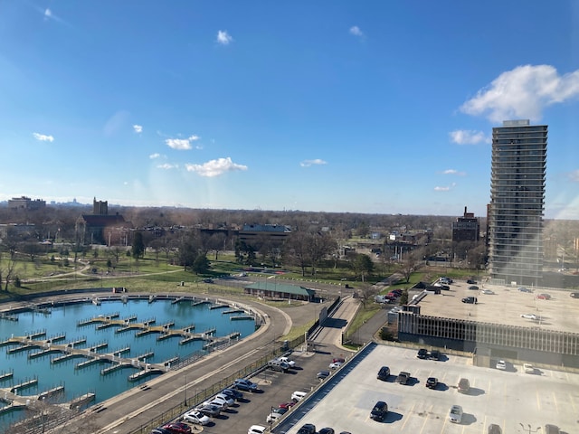 birds eye view of property with a water view