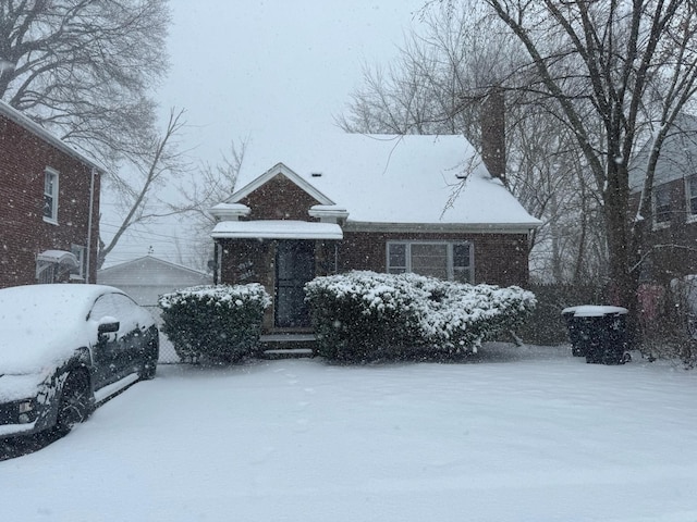 20920/2 Moross Rd, Grosse Pointe, MI 48236 - view of front of home with a chimney and brick siding