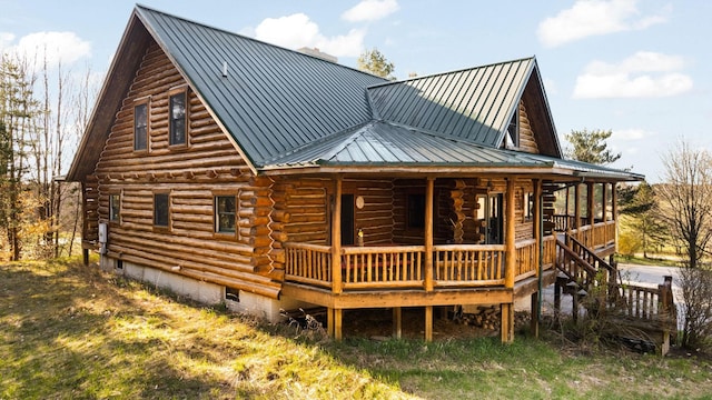 back of house featuring covered porch