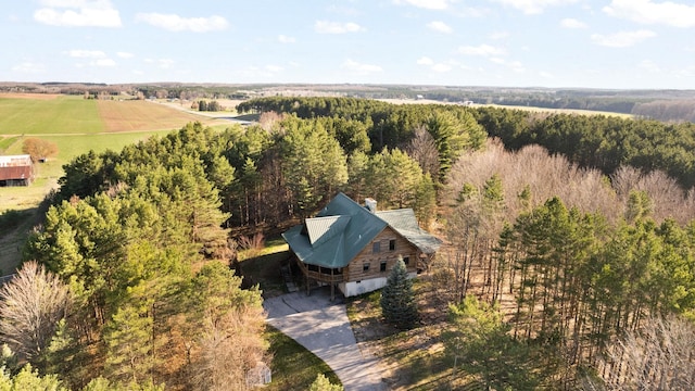 birds eye view of property with a rural view