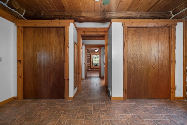 hall featuring wooden ceiling