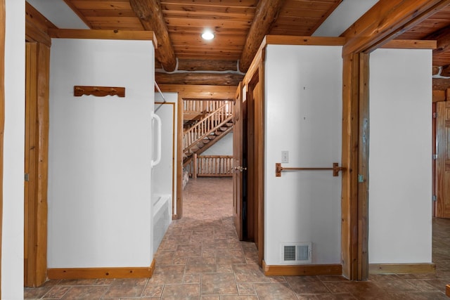 corridor with beam ceiling and wood ceiling