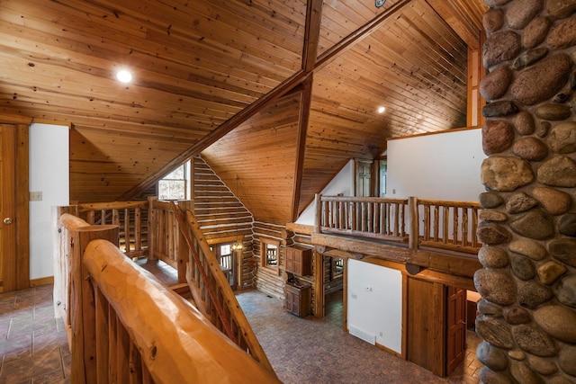 hallway with high vaulted ceiling and wooden ceiling