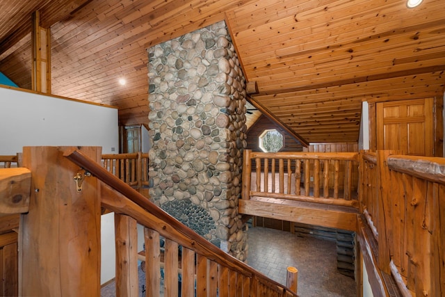 hall with wooden ceiling and lofted ceiling