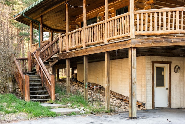 exterior space featuring a wooden deck