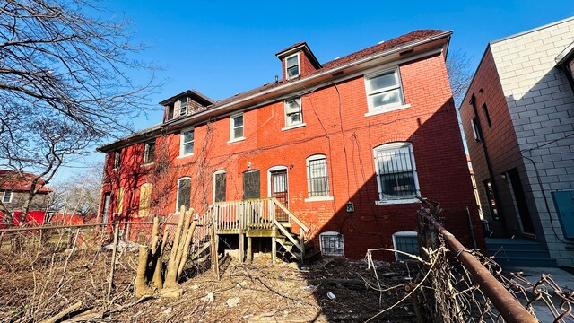 108 Mount Vernon St, Detroit, MI 48202 - rear view of house featuring central air condition unit and brick siding