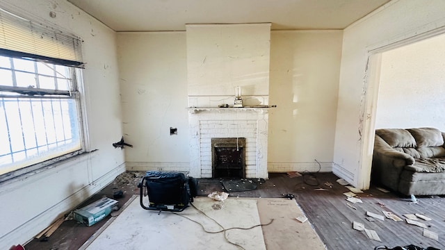 108 Mount Vernon St, Detroit, MI 48202 - unfurnished living room with wood finished floors and a fireplace