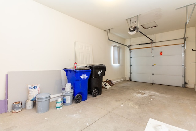 garage featuring a garage door opener