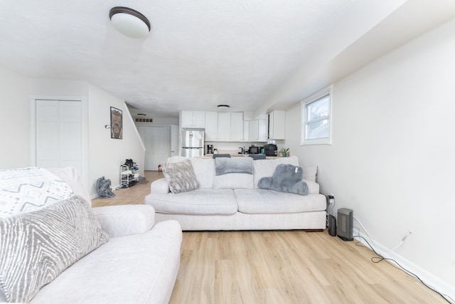 living room featuring light hardwood / wood-style flooring