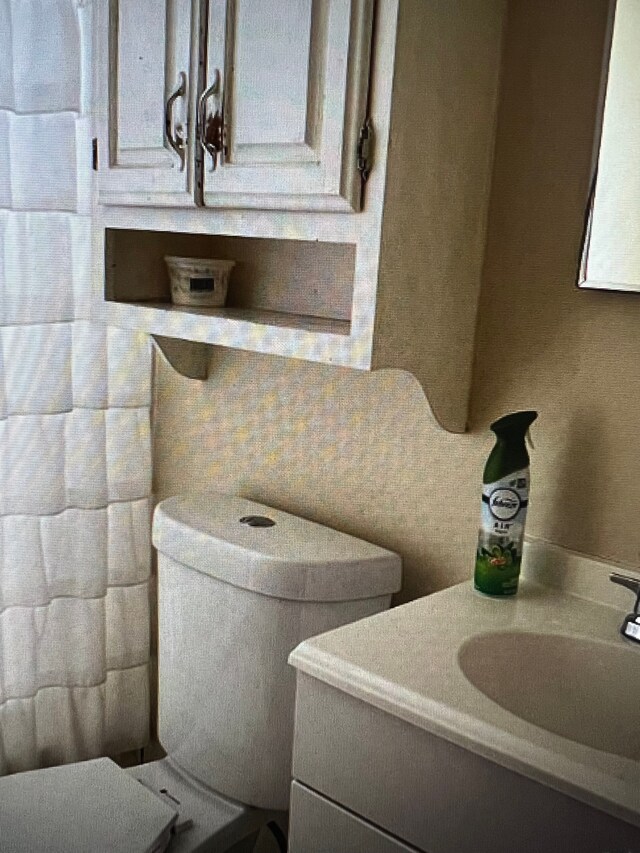 15920 Bramell St, Detroit, MI 48223 - bathroom with toilet and vanity