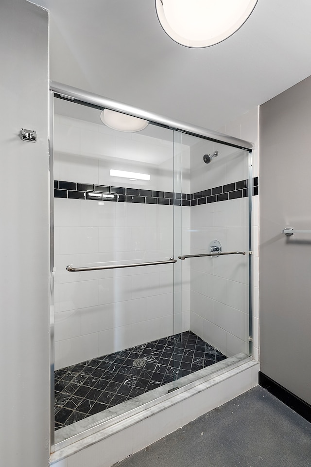 bathroom with an enclosed shower