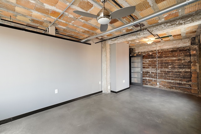 basement featuring ceiling fan