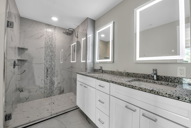 bathroom with vanity and walk in shower