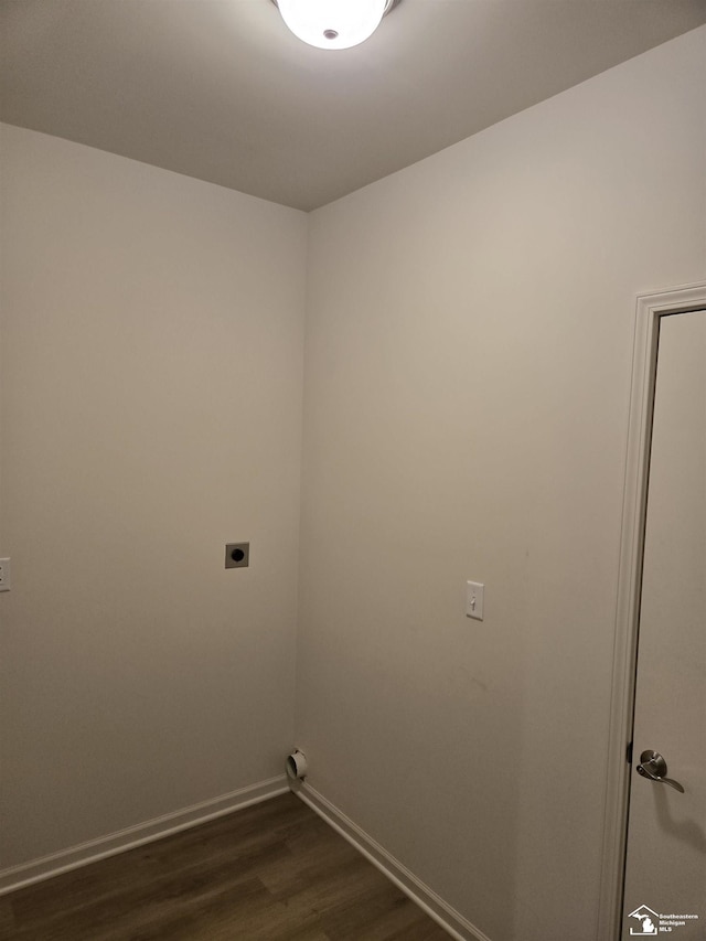 laundry room with dark wood-style floors, laundry area, baseboards, and hookup for an electric dryer