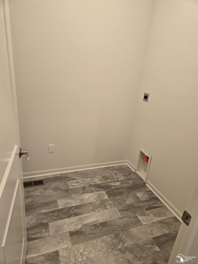 803 Plum Village Dr, Monroe, MI 48161 - laundry area featuring electric dryer hookup, baseboards, and washer hookup