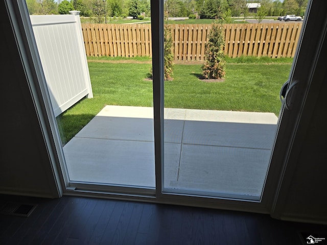 803 Plum Village Dr, Monroe, MI 48161 - doorway to outside featuring hardwood / wood-style floors