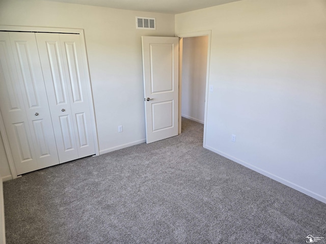 803 Plum Village Dr, Monroe, MI 48161 - unfurnished bedroom with carpet floors, baseboards, and a closet