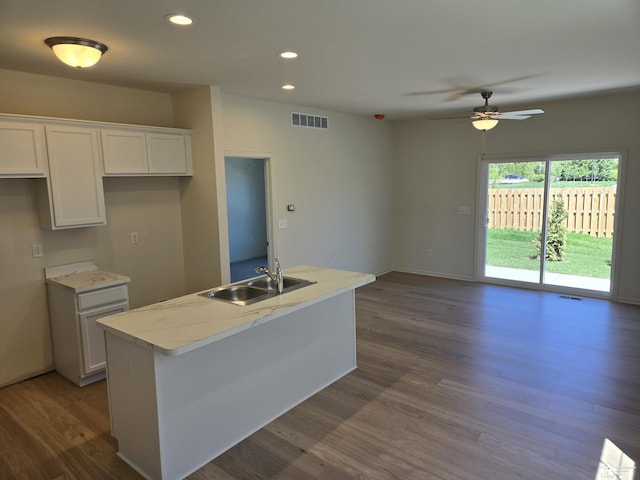 807 Plum Village Dr, Monroe, MI 48161 - kitchen featuring a sink, white cabinets, ceiling fan, dark wood-type flooring, and recessed lighting