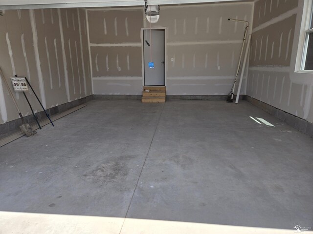 805 Plum Village Dr, Monroe, MI 48161 - garage with a garage door opener