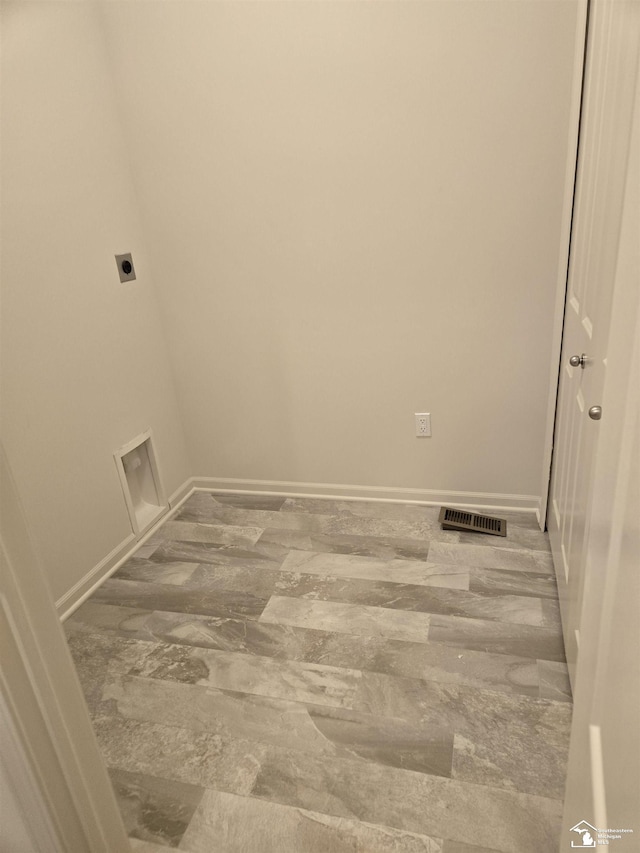 805 Plum Village Dr, Monroe, MI 48161 - laundry area featuring electric dryer hookup and baseboards