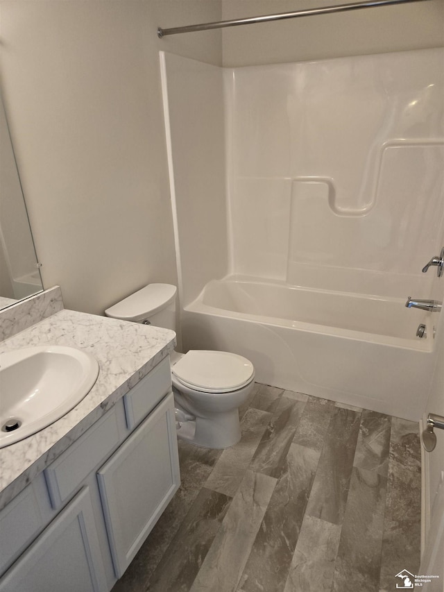 805 Plum Village Dr, Monroe, MI 48161 - full bathroom featuring toilet, bathing tub / shower combination, and vanity