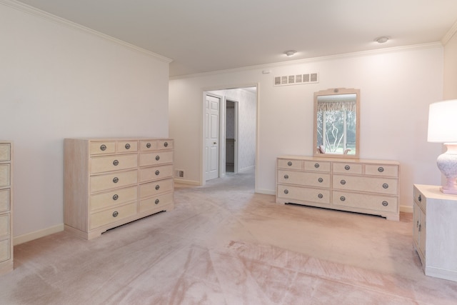 unfurnished bedroom featuring light carpet and crown molding