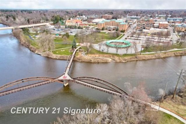 110 E Main St, Midland, MI 48640 - aerial view of property and surrounding area featuring a large body of water and a notable bridge