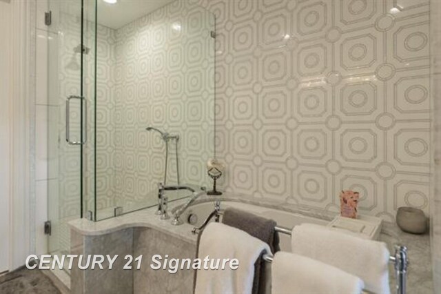 110 E Main St, Midland, MI 48640 - bathroom with wallpapered walls and tiled shower