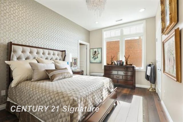 110 E Main St, Midland, MI 48640 - bedroom with baseboards, dark wood-style floors, wallpapered walls, and recessed lighting