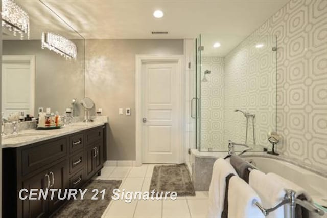 bathroom with vanity, tile patterned floors, and independent shower and bath