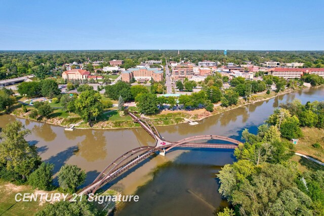 110 E Main St, Midland, MI 48640 - aerial overview of property's location with a large body of water and a notable bridge